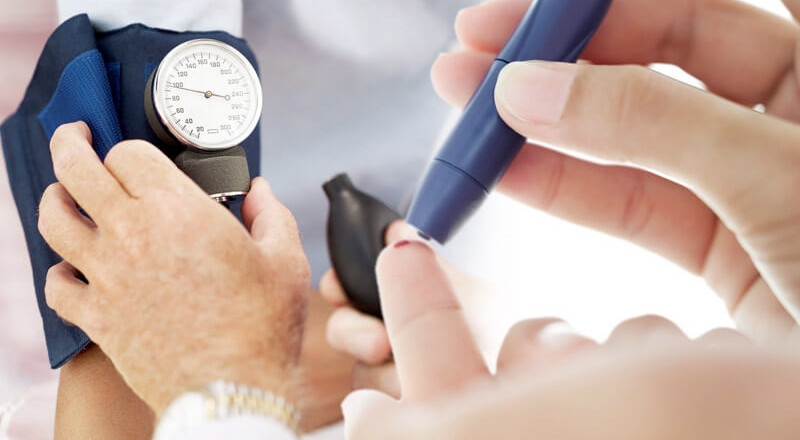 Doctor Checking Blood Pressure